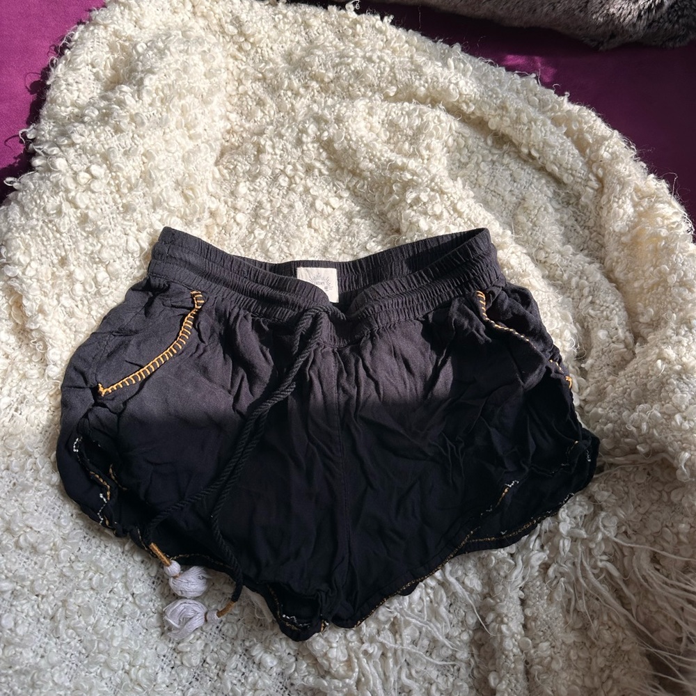 Black vintage shorts with threaded yellow size 4 fits very small